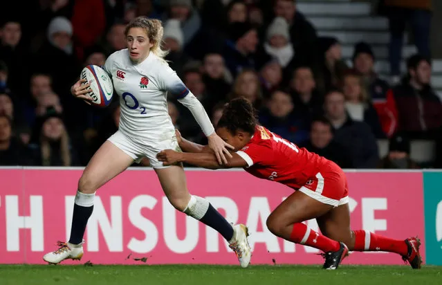 Abigail Dow of England is tackled by Dria Bennett of Canada during the Old Mutual Wealth Series match between England and Canada at Twickenham Stadium on November 25, 2017 in London, England. (Photo by Paul Childs/Reuters/Action Images)