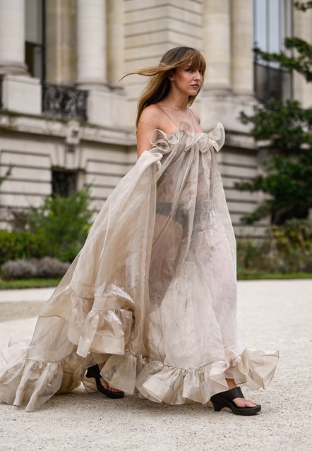 Model Carla Ginola is seen wearing a ruffled sheer Zimmermann dress and black shoes outside the Zimmermann show during the Womenswear Fall/Winter 2025/2026 as part of Paris Fashion Week on March 10, 2025 in Paris, France. (Photo by Daniel Zuchnik/Getty Images)