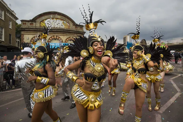 Performers take part in the Notting Hill Carnival on August 29, 2016 in London, England. The Notting Hill Carnival, which has taken place annually since 1964, is expected to attract over a million people. The two-day event, started by members of the Afro-Caribbean community, sees costumed performers take to the streets in a parade and dozens of sound systems set up around the Notting Hill streets. (Photo by Jack Taylor/Getty Images)