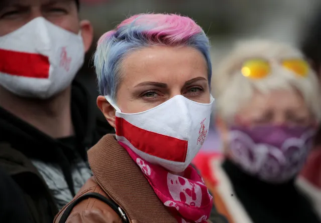 Opposition supporters wearing protective face masks attend a rally in Minsk, Belarus, 24 May 2020. The presidential campaign has kicked off in Belarus, with the election scheduled for 09 August 2020. Incumbent President Alexander Lukashenko, who has held an iron grip on power since Belarus' independence in 1991, is the clear frontrunner to win reelection for a sixth consecutive term. (Photo by Tatyana Zenkovich/EPA/EFE)