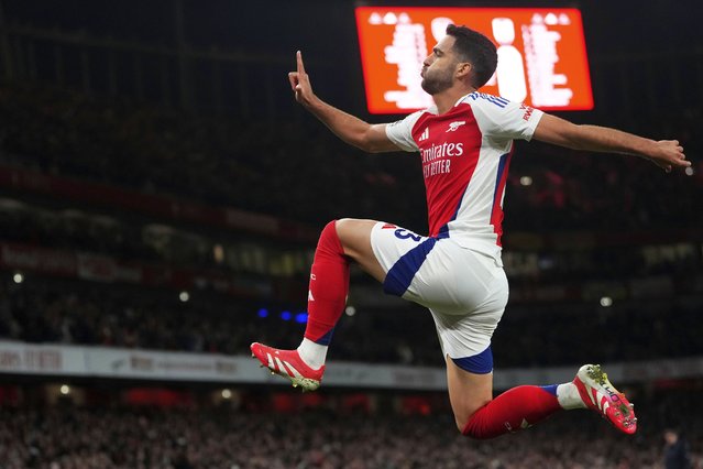 Arsenal's Mikel Merino celebrates after scoring the opening goal during the English Premier League soccer match between Arsenal and Fulham at Emirates stadium in London, Tuesday, April 1, 2025. (Photo by Kirsty Wigglesworth/AP Photo)