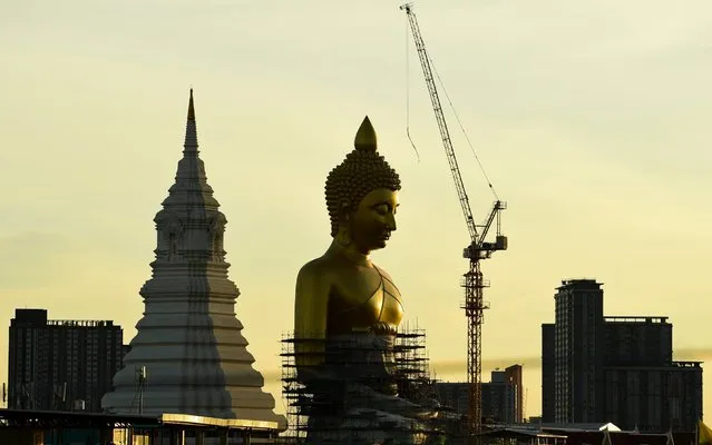 Large Buddha a 69-metre-tall statue with a 40-metre lap has been built at Wat Paknam Bhasicharoen, Phasi Charoen district, in Bangkok, Thailand, on June 20, 2020. (Photo by Anusak Laowilas/NurPhoto via Getty Images)