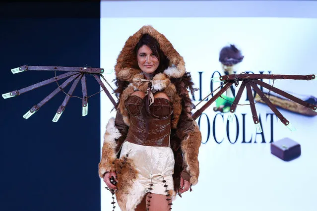 Marion Dumas walks the runway and wears a chocolate dress made by stylist Valerie Pache and chocolate maker Stephane Bonnat during the Fashion Chocolate show at Salon du Chocolat at Parc des Expositions Porte de Versailles on October 28, 2014 in Paris, France. (Photo by Richard Bord/Getty Images)