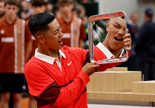 Japan's Tokito Oda poses with the trophy after winning his men's wheelchair singles final against Britain's Alfie Hewett on June 7, 2025. (Photo by Stephanie Lecocq/Reuters)