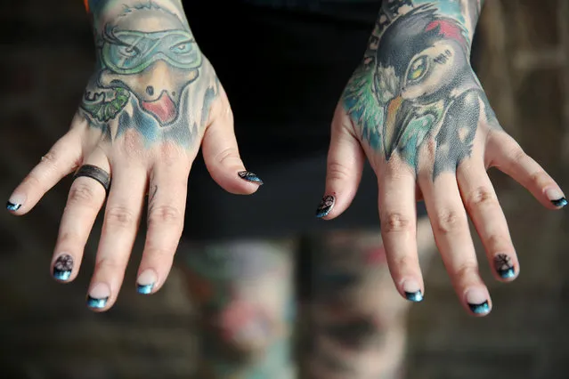 A tattoo enthusiast poses at the International London Tattoo Convention in London, Britain September 23, 2016. (Photo by Neil Hall/Reuters)