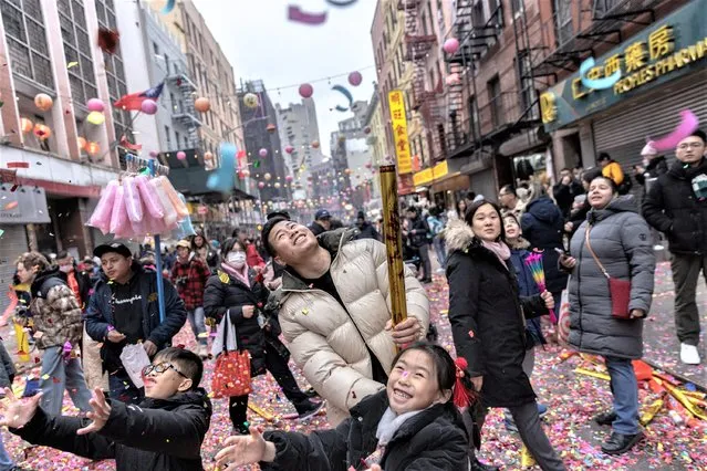People celebrate the year of the Rabbit during the Lunar New Year Parade in Chinatown in New York City, U.S., January 22, 2023. (Photo by Jeenah Moon/Reuters)