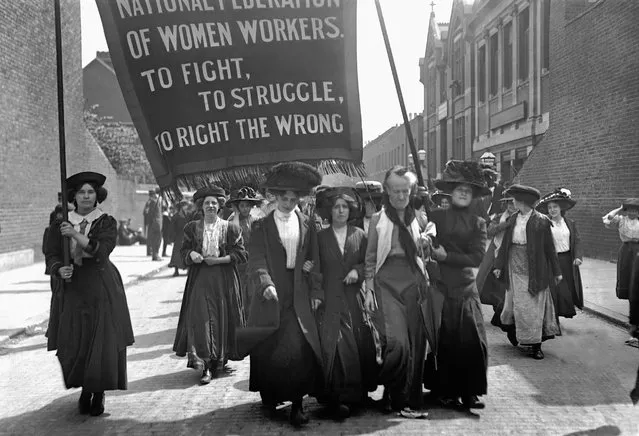 British suffragette Charlotte Despard (1844 - 1939) (wearing a white waistcoat) heads a march of the National Federation of Women Workers through Bermondsey in South London, 16th May 1911. (Photo by Topical Press Agency/Getty Images)