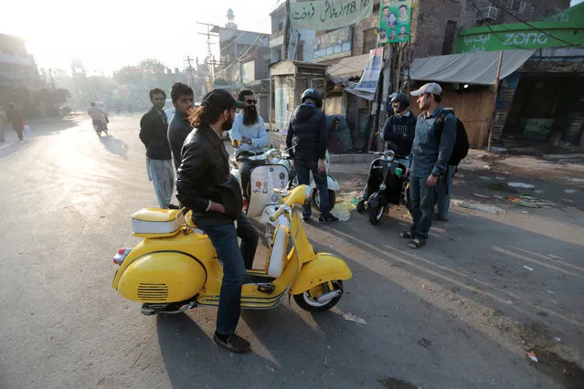 As cheap Chinese-made motorbikes flood Pakistan’s roads, fans of vintage Vespa scooters are scrambling to find spare parts and preserve models that hark back to a bygone era. Piaggio’s Italian two-wheeler was the ultimate status symbol for Pakistani bike aficionados in the 1960s and 70s, when bicycles outstripped motorbikes on the roads and only a handful of people could afford to import luxury items from Europe. Over the past two decades, motorbike ownership rates have skyrocketed in Pakistan, with locally assembled Chinese and Japanese bikes clogging up the roads in a country where much of the population is below the age of 30. Here: Members of a Vespa rider's club gather at sunrise for a ride in Lahore, Pakistan March 11, 2018. (Photo by Akhtar Soomro/Reuters)