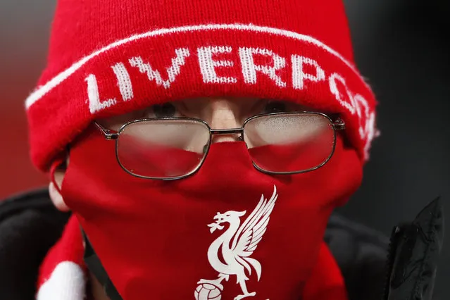 A Liverpool fan on the stands waits for the start of the English Premier League soccer match between Liverpool and Wolverhampton Wanderers at Anfield Stadium, Liverpool, England, Sunday, December 6, 2020. (Photo by Clive Brunskill/Pool via AP Photo)