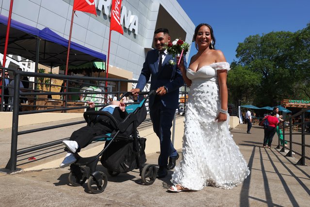 A couple participates in a mass wedding ceremony at the National Sports Secretariat in Asuncion, Paraguay, 04 October 2025. More than 600 bridal couples were married in what is considered the largest collective wedding in Paraguay's history. The free ceremony took place in the sports arena as part of a government-supported campaign, themed “United by love, protected by the law”. (Photo by Juan Pablo Pino/EPA)