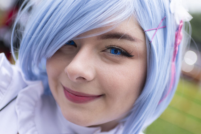 A visitor dressed up as an anime character attends the Festival Kamen 2024 at the National Stadium in San Jose on July 14, 2024. Festival Kamen is the most important event for pop culture fans in Costa Rica. (Photo by Ezequiel Becerra/AFP Photo)