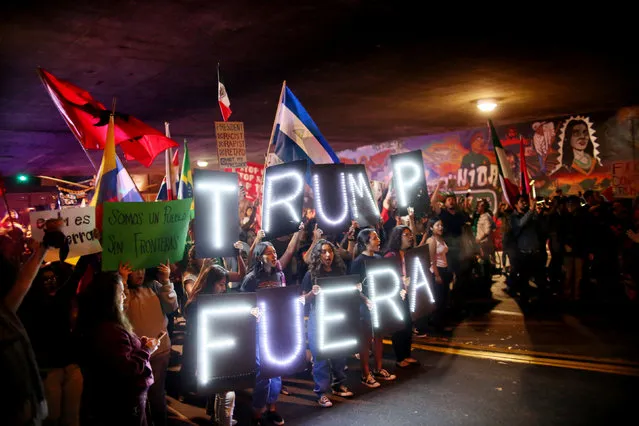 Demonstrators stage a rally against President-elect Donald Trump in the Barrio Logan area of in San Diego, California, U.S. November 11, 2016. (Photo by Sandy Huffaker/Reuters)