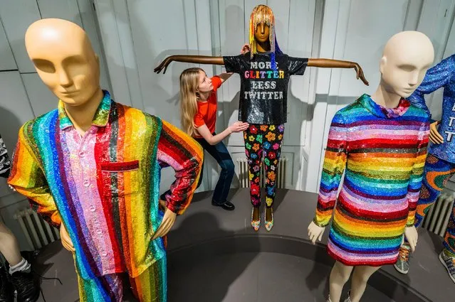 A glitter rainbow mini dress, worn by Taylor Swift in her “End Game” music video, and other outfits in the William Morris Gallery in London, United Kingdom on March 31, 2023 unveils an exhibition of fashion designer Ashish. (Photo by Guy Bell/Alamy Live News)