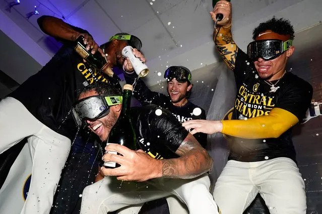 Milwaukee Brewers' Freddy Peralta is doused as the Brewers celebrate after clinching the NL Central, after a baseball game against the St. Louis Cardinals on Tuesday, September 26, 2023, in Milwaukee. (Photo by Morry Gash/AP Photo)