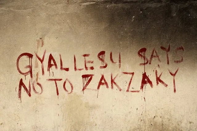Graffiti on the walls of a house that was destroyed during clashes between Shi'ites and the army reads “Gyallesu says no to Zakzaky” in Zaria, Kaduna state, Nigeria, February 3, 2016. (Photo by Afolabi Sotunde/Reuters)