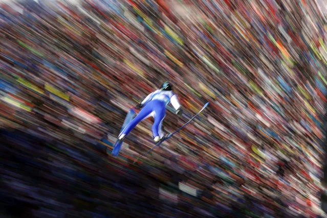 United States' Andrew Urlaub soars through the air during the Ski Jumping HS130 event, at the Nordic Ski World Championships in Innsbruck, Austria, Saturday, February 23, 2019. (Photo by Matthias Schrader/AP Photo)