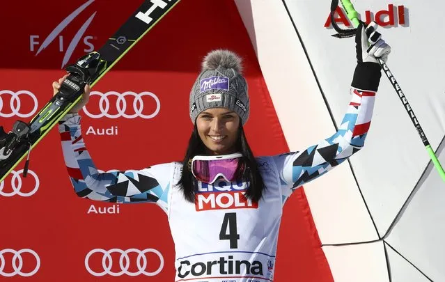 Austria's Anna Veith celebrates her third place in a alpine ski, women's World Cup super-G, in Cortina d'Ampezzo, Italy, Sunday, January 29, 2017. (Photo by Alessandro Trovati/AP Photo)