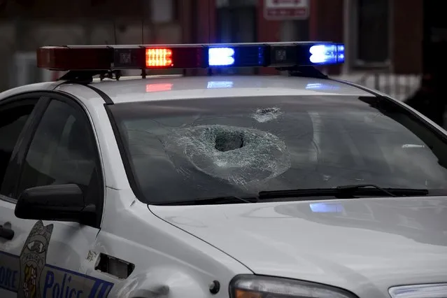 A police car travels on Pennsylvania Avenue in Baltimore April 27, 2015. (Photo by Sait Serkan Gurbuz/Reuters)