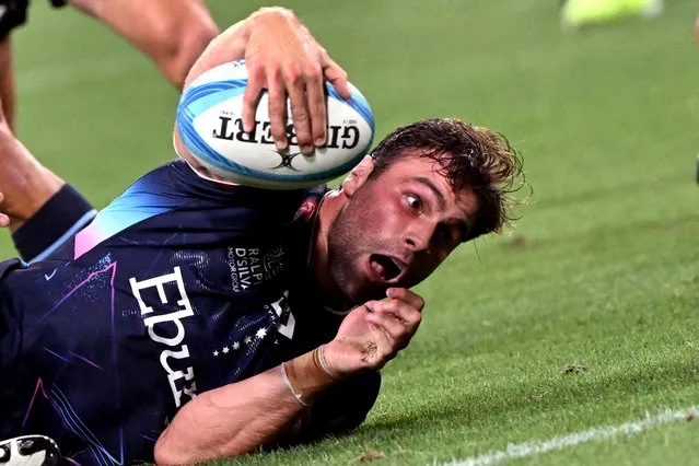 Rebels player Josh Kemeny scores a try during the Super Rugby match between the Melbourne Rebels and the Western Force in Melbourne on March 1, 2024. (Photo by William West/AFP Photo)