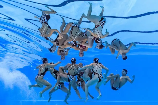 Team Chile competes in the final of the acrobatic routine artistic swimming event during the 2024 World Aquatics Championships at Aspire Dome in Doha on February 4, 2024. (Photo by Manan Vatsyayana/AFP Photo)