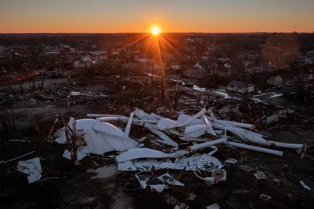A water tower for the town is seen destroyed in the aftermath of a tornado at sunrise in Mayfield, Kentucky, U.S. December 13, 2021. Picture taken with a drone. (Photo by Adrees Latif/Reuters)