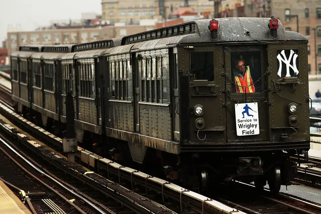 A historical subway train is used for the 2014 home opener game at Yankee stadium on April 7, 2014 in New York City. The Monday afternoon game against the Baltimore Orioles will feature Derek Jeter, the first home game of his final season for the Yankees. (Photo by Spencer Platt/Getty Images)