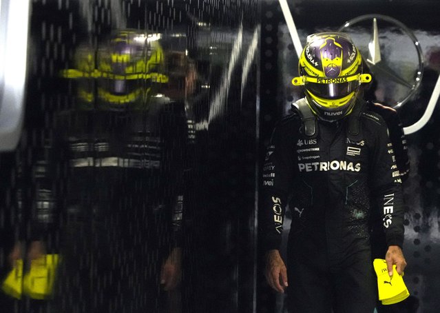 Mercedes driver Lewis Hamilton of Britain walks out of the garage after the first practice session for the Formula 1 Japanese Grand Prix at the Suzuka International Racing Course in Suzuka, Japan, 05 April 2024. The 2024 Formula 1 Japanese Grand Prix will be held on 07 April. (Photo by Franck Robichon/EPA)