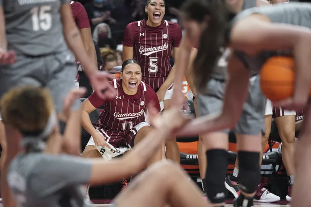 South Carolina guard Destiny Littleton (11) and South Carolina forward Victaria Saxton (5) cheer on their teammates during the second half of an NCAA college basketball game against Vanderbilt Monday, January 24, 2022, in Columbia, S.C. South Carolina won 85-30. (Photo by Sean Rayford/AP Photo)