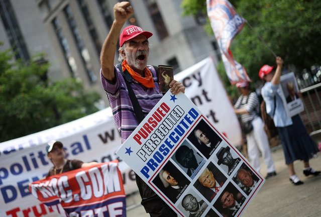 A supporter of former U.S. President Donald Trump reacts outside the Manhattan criminal court during jury deliberations in New York City on May 29, 2024. (Photo by Mike Segar/Reuters)