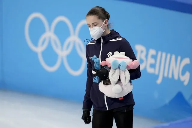 Kamila Valieva, of the Russian Olympic Committee, leaves after a training session at the 2022 Winter Olympics, Sunday, February 13, 2022, in Beijing. (Photo by Natacha Pisarenko/AP Photo)