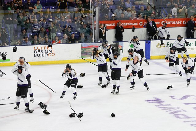Minnesota players celebrate after defeating Boston to become the inaugural champions of the Professional Women's Hockey League on Wednesday, May 29, 2024. (Photo by Mingo Nesmith/Icon Sportswire/AP Photo)