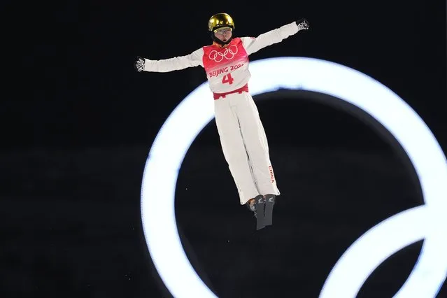 China's Qi Guangpu competes during the men's aerials qualification at the 2022 Winter Olympics, Tuesday, February 15, 2022, in Zhangjiakou, China. (Photo by Lee Jin-man/AP Photo)