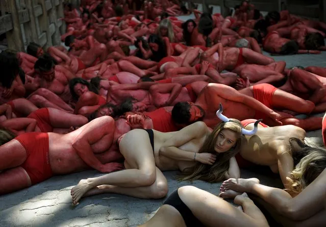 Animal rights protesters demonstrate for the abolition of bull runs and bullfights, three days before the start of the famous running of the bulls San Fermin festival in Pamplona, northern Spain, July 4, 2015. (Photo by Eloy Alonso/Reuters)