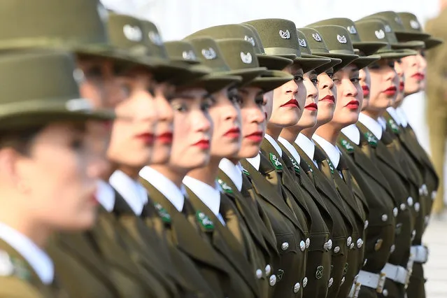 Female police officers march during a military parade in Santiago, on September 19, 2019, at the 209th anniversary of Chile's independence. (Photo by Jorge Villegas/Xinhua News Agency/Barcroft Media)