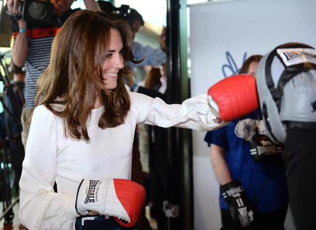 Kate, the Duchess of Cambridge, boxes with former boxer Duke McKenzie during the launch of Heads Together, the ambitious new campaign to end stigma on mental health, at the Olympic Park in London, Monday, May 16, 2016. (Photo by Jeremy Selwyn/Pool Photo via AP Photo)