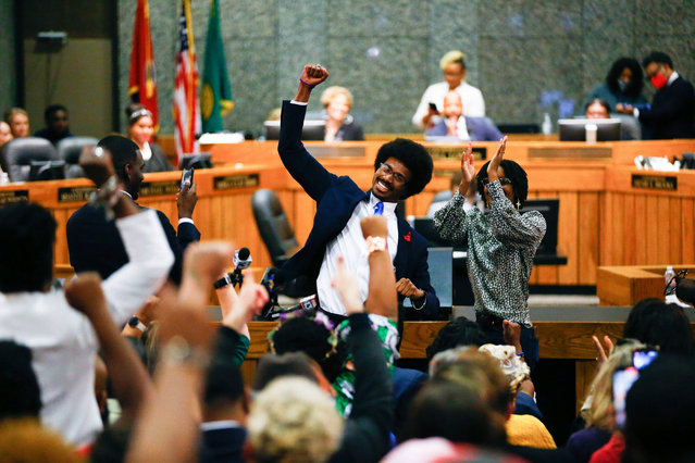 Justin Pearson celebrates with supporters after being reinstated to the Tennessee House of Representatives by the Shelby County Board of Commissioners building in Memphis, Tenn., on Wednesday, April 12, 2023. Republicans expelled Pearson and Rep. Justin Jones last week over their role in a gun control protest on the House floor. (Photo by Chris Day/The Commercial Appeal via AP Photo)