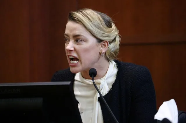 US actress Amber Heard testifies at the Fairfax County Circuit Courthouse in Fairfax, Virginia, on May 5, 2022. Actor Johnny Depp is suing ex-wife Amber Heard for libel after she wrote an op-ed piece in The Washington Post in 2018 referring to herself as a “public figure representing domestic abuse”. (Photo by Jim Lo Scalzo/Pool via AFP Photo)