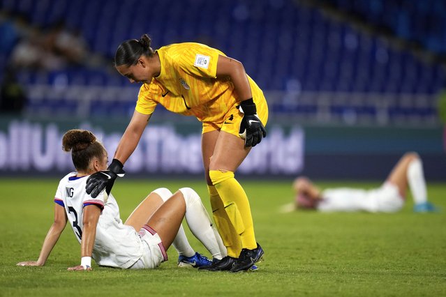 Goalkeeper Teagan Wy, of the United States, comforts Savannah King after they lost to North Korea in a U-20 Women's World Cup semifinal soccer match in Cali, Colombia, Wednesday, September 18, 2024. (Photo by Fernando Vergara/AP Photo)