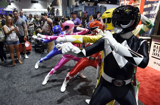 Power Ranger characters strike a pose for Comic-Con attendees during Preview Night of the 2017 Comic-Con International on Wednesday, July 19, 2017, in San Diego, Calif. (Photo by Chris Pizzello/Invision/AP Photo)