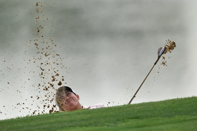 Thailand"s Jeeno Thitikul hits out of the bunker during the third round of the Shanghai LPGA golf tournament in Shanghai on October 12, 2024. (Photo by AFP Photo/China Stringer Network)