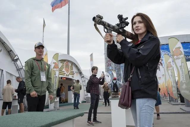A girl with Russian grenade launcher. Russian international military expo Army Expo 2022 at Patriot park in Kubinka, Moscow, Russia, on August 20, 2022. (Photo for The Washington Post)