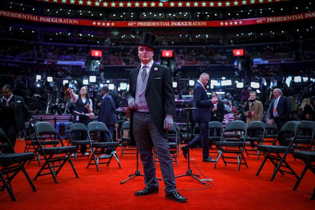 Alek Drexler from Illinois poses inside Capital One arena ahead of an indoor rally on the day of the presidential inauguration of Donald Trump, in Washington, U.S. January 20, 2025. “It's just a great atmosphere," said Drexler. "And people aren't freezing, so they'll have a good time”. (Photo by Amanda Perobelli/Reuters)