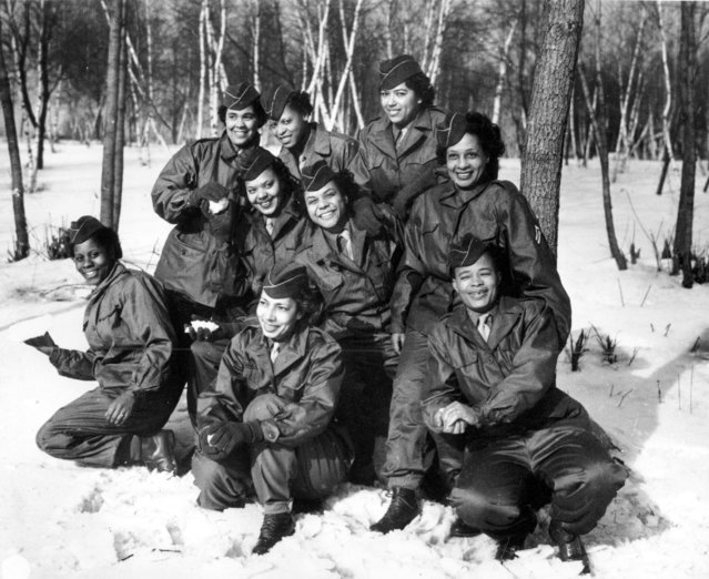 Members of the Women's Army Corps pose at Camp Shanks, N.Y., before leaving on February 2, 1945. The women were with the first contingent of the Black American WAC to go overseas for the war effort. (Photo by AP Photo)