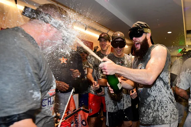 Dallas Keuchel #60 of the Houston Astros celebrates with teammates in the clubhouse after defeating the Los Angeles Dodgers 5-1 in game seven to win the 2017 World Series at Dodger Stadium on November 1, 2017 in Los Angeles, California. (Photo by Harry How/Getty Images)