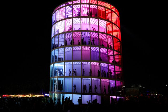 People visit an art installation at the Coachella Valley Music and Arts Festival in Indio, California, U.S., April 11, 2025. (Photo by Daniel Cole/Reuters)