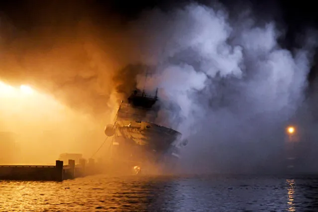 The Russian fishing trawler Bukhta Naezdnik burns in the harbour of Tromso, Norway on September 26, 2019. (Photo by Rune Stoltz Bertinussen/NTB Scanpix via Reuters)