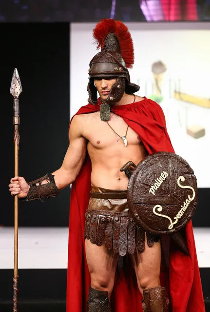 Clement Becq walks the runway and wears a chocolate costume made by chocolate maker Jean-Luc Decluzeau during the Fashion Chocolate show at Salon du Chocolat at Parc des Expositions Porte de Versailles on October 28, 2014 in Paris, France. (Photo by Richard Bord/Getty Images)