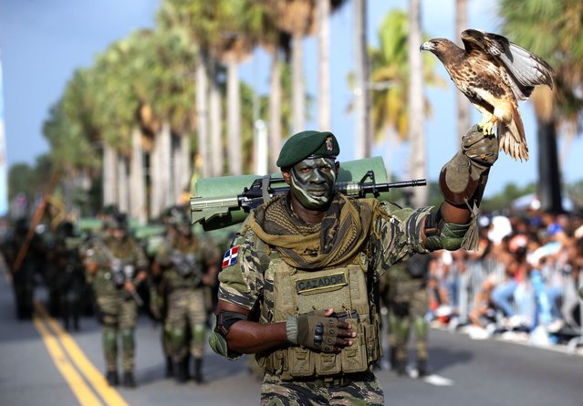 A member of the Armed Forces participates in a military parade to commemorate the 180th anniversary of the National Independence of the Dominican Republic on the Malecon in Santo Domingo, Dominican Republic, on 27 February 2024. (Photo by Orlando Barria/EPA)