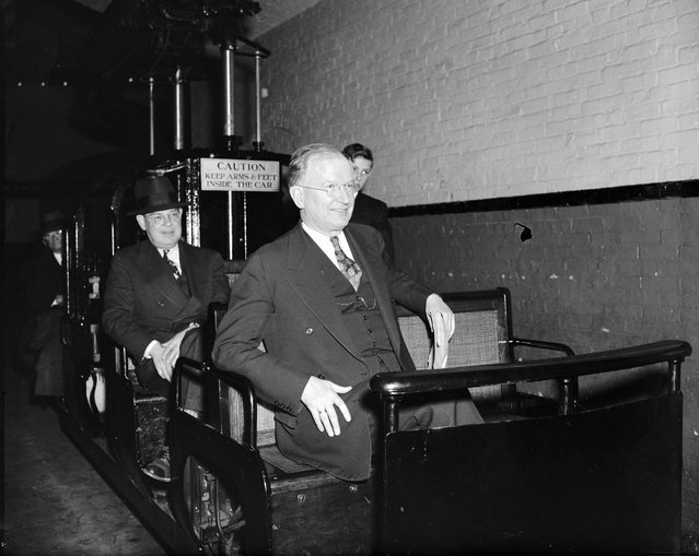 “No rail troubles here. Washington, D.C., February 10. Apparently no rail troubles in the Senate subway indicates Senator Burton K. Wheeler as he rides the tram car between the Senate office building and the Capitol. Senator Wheeler is Chairman of the Senate Interstate Commerce Committee which is now studying the nation's railroad problems, February 10, 1939”. (Photo by Harris & Ewing Collection)