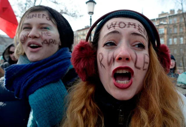 Feminists take part in a rally for gender equality and against violence towards women on International Women' s Day in Saint Petersburg on March 8, 2018. (Photo by Olga Maltseva/AFP Photo)